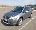 Серый Сузуки СХ4, объемом двигателя 1.6 л и пробегом 300 тыс. км за 5700 $, фото 1 на Automoto.ua