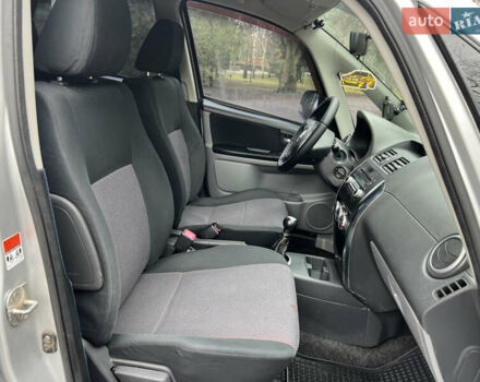 Серый Сузуки СХ4, объемом двигателя 1.59 л и пробегом 209 тыс. км за 5150 $, фото 24 на Automoto.ua