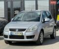 Серый Сузуки СХ4, объемом двигателя 1.91 л и пробегом 252 тыс. км за 4950 $, фото 1 на Automoto.ua