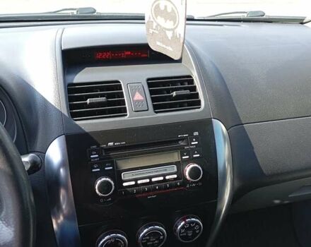 Серый Сузуки СХ4, объемом двигателя 1.6 л и пробегом 300 тыс. км за 5700 $, фото 10 на Automoto.ua