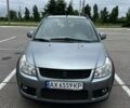 Серый Сузуки СХ4, объемом двигателя 1.6 л и пробегом 200 тыс. км за 4000 $, фото 1 на Automoto.ua