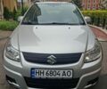 Серый Сузуки СХ4, объемом двигателя 2 л и пробегом 120 тыс. км за 7500 $, фото 2 на Automoto.ua