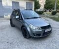 Серый Сузуки СХ4, объемом двигателя 1.6 л и пробегом 250 тыс. км за 3850 $, фото 1 на Automoto.ua