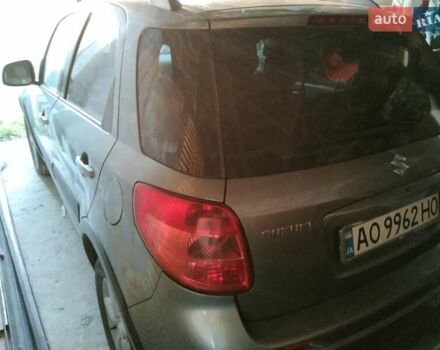 Серый Сузуки СХ4, объемом двигателя 1.6 л и пробегом 210 тыс. км за 6500 $, фото 2 на Automoto.ua