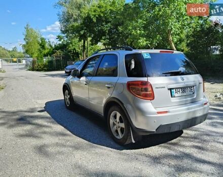 Серый Сузуки СХ4, объемом двигателя 1.6 л и пробегом 233 тыс. км за 5400 $, фото 3 на Automoto.ua