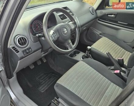 Серый Сузуки СХ4, объемом двигателя 1.6 л и пробегом 175 тыс. км за 5800 $, фото 16 на Automoto.ua