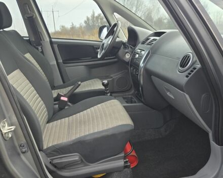 Серый Сузуки СХ4, объемом двигателя 1.6 л и пробегом 175 тыс. км за 5800 $, фото 4 на Automoto.ua