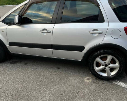 Серый Сузуки СХ4, объемом двигателя 1.59 л и пробегом 234 тыс. км за 7000 $, фото 9 на Automoto.ua