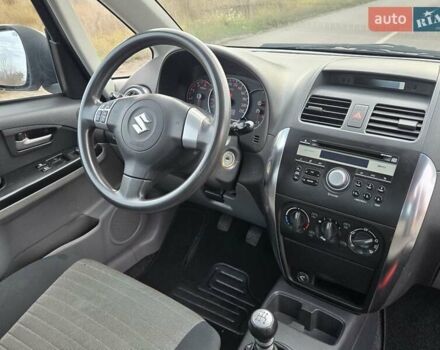 Серый Сузуки СХ4, объемом двигателя 1.6 л и пробегом 175 тыс. км за 5800 $, фото 10 на Automoto.ua
