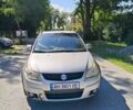Серый Сузуки СХ4, объемом двигателя 1.6 л и пробегом 233 тыс. км за 5400 $, фото 1 на Automoto.ua