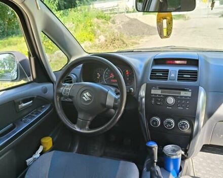 Серый Сузуки СХ4, объемом двигателя 1.6 л и пробегом 233 тыс. км за 5400 $, фото 11 на Automoto.ua