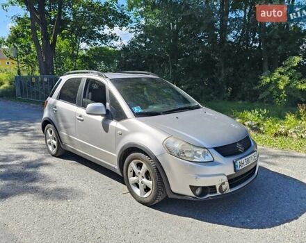 Серый Сузуки СХ4, объемом двигателя 1.6 л и пробегом 233 тыс. км за 5400 $, фото 1 на Automoto.ua