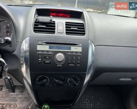 Серый Сузуки СХ4, объемом двигателя 1.6 л и пробегом 148 тыс. км за 5200 $, фото 10 на Automoto.ua