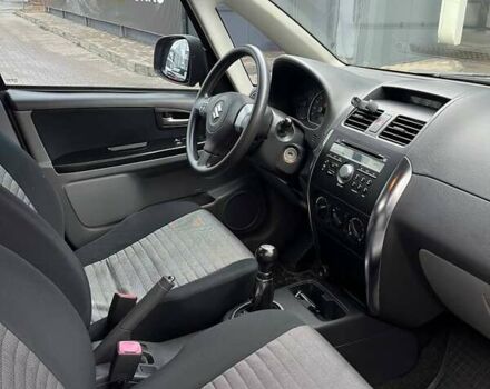 Серый Сузуки СХ4, объемом двигателя 1.6 л и пробегом 148 тыс. км за 5200 $, фото 12 на Automoto.ua