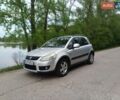 Серый Сузуки СХ4, объемом двигателя 1.9 л и пробегом 245 тыс. км за 5600 $, фото 1 на Automoto.ua