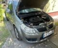 Серый Сузуки СХ4, объемом двигателя 1.6 л и пробегом 204 тыс. км за 5900 $, фото 1 на Automoto.ua