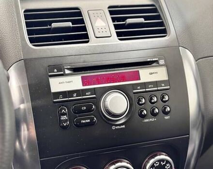 Серый Сузуки СХ4, объемом двигателя 1.6 л и пробегом 133 тыс. км за 7999 $, фото 102 на Automoto.ua