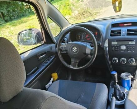Серый Сузуки СХ4, объемом двигателя 1.6 л и пробегом 233 тыс. км за 5400 $, фото 12 на Automoto.ua