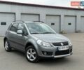 Серый Сузуки СХ4, объемом двигателя 1.6 л и пробегом 205 тыс. км за 5800 $, фото 1 на Automoto.ua