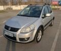 Серый Сузуки СХ4, объемом двигателя 1.6 л и пробегом 326 тыс. км за 6000 $, фото 2 на Automoto.ua