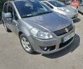 Серый Сузуки СХ4, объемом двигателя 1.59 л и пробегом 206 тыс. км за 5800 $, фото 1 на Automoto.ua