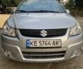 Серый Сузуки СХ4, объемом двигателя 1.6 л и пробегом 200 тыс. км за 5498 $, фото 1 на Automoto.ua