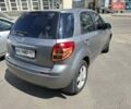 Серый Сузуки СХ4, объемом двигателя 1.59 л и пробегом 206 тыс. км за 5800 $, фото 4 на Automoto.ua