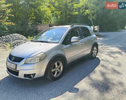 Серый Сузуки СХ4, объемом двигателя 1.6 л и пробегом 233 тыс. км за 5400 $, фото 2 на Automoto.ua