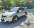Серый Сузуки СХ4, объемом двигателя 1.6 л и пробегом 233 тыс. км за 5300 $, фото 2 на Automoto.ua