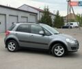 Серый Сузуки СХ4, объемом двигателя 1.6 л и пробегом 205 тыс. км за 5800 $, фото 3 на Automoto.ua