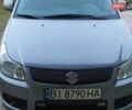 Серый Сузуки СХ4, объемом двигателя 1.6 л и пробегом 220 тыс. км за 6700 $, фото 1 на Automoto.ua