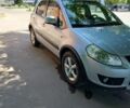 Сірий Сузукі СХ4, об'ємом двигуна 1.59 л та пробігом 242 тис. км за 4999 $, фото 2 на Automoto.ua