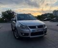 Серый Сузуки СХ4, объемом двигателя 1.6 л и пробегом 245 тыс. км за 5300 $, фото 1 на Automoto.ua