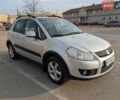 Серый Сузуки СХ4, объемом двигателя 1.6 л и пробегом 326 тыс. км за 6000 $, фото 1 на Automoto.ua