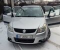 Серый Сузуки СХ4, объемом двигателя 1.59 л и пробегом 389 тыс. км за 4400 $, фото 1 на Automoto.ua
