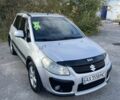 Серый Сузуки СХ4, объемом двигателя 1.6 л и пробегом 212 тыс. км за 7000 $, фото 1 на Automoto.ua