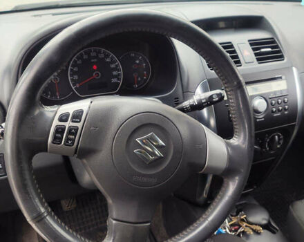 Серый Сузуки СХ4, объемом двигателя 1.59 л и пробегом 232 тыс. км за 6100 $, фото 9 на Automoto.ua