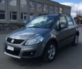 Серый Сузуки СХ4, объемом двигателя 1.6 л и пробегом 180 тыс. км за 7000 $, фото 1 на Automoto.ua