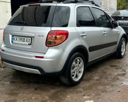 Серый Сузуки СХ4, объемом двигателя 1.6 л и пробегом 243 тыс. км за 7000 $, фото 2 на Automoto.ua