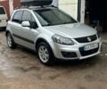 Серый Сузуки СХ4, объемом двигателя 1.6 л и пробегом 243 тыс. км за 7000 $, фото 1 на Automoto.ua