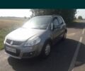 Сірий Сузукі СХ4, об'ємом двигуна 2 л та пробігом 200 тис. км за 7840 $, фото 1 на Automoto.ua
