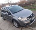 Серый Сузуки СХ4, объемом двигателя 2 л и пробегом 395 тыс. км за 6400 $, фото 1 на Automoto.ua
