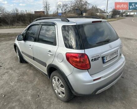 Серый Сузуки СХ4, объемом двигателя 1.6 л и пробегом 150 тыс. км за 8000 $, фото 2 на Automoto.ua