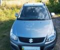 Сірий Сузукі СХ4, об'ємом двигуна 1.6 л та пробігом 68 тис. км за 11000 $, фото 1 на Automoto.ua