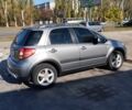 Серый Сузуки СХ4, объемом двигателя 1.6 л и пробегом 144 тыс. км за 7900 $, фото 2 на Automoto.ua