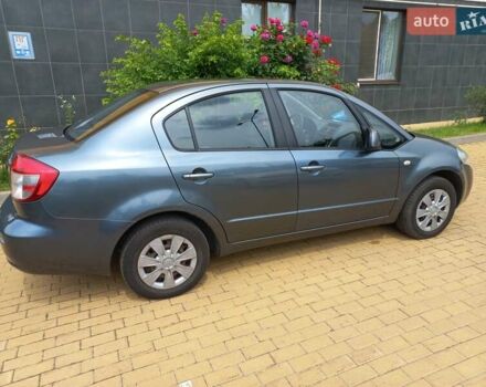 Серый Сузуки СХ4, объемом двигателя 1.59 л и пробегом 250 тыс. км за 5500 $, фото 6 на Automoto.ua