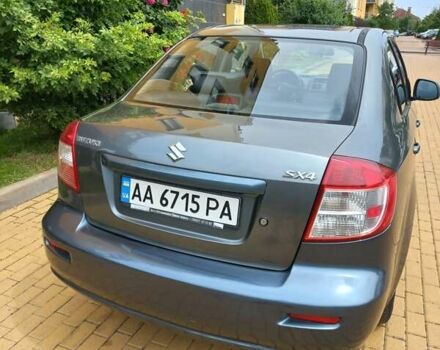 Серый Сузуки СХ4, объемом двигателя 1.59 л и пробегом 250 тыс. км за 5500 $, фото 2 на Automoto.ua