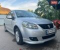 Серый Сузуки СХ4, объемом двигателя 1.59 л и пробегом 178 тыс. км за 6300 $, фото 1 на Automoto.ua
