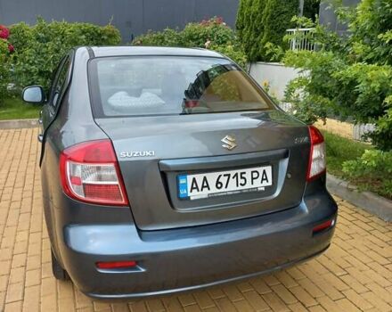 Серый Сузуки СХ4, объемом двигателя 1.59 л и пробегом 250 тыс. км за 5500 $, фото 3 на Automoto.ua