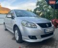 Серый Сузуки СХ4, объемом двигателя 1.59 л и пробегом 178 тыс. км за 6100 $, фото 1 на Automoto.ua